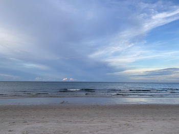 Scenic view of beach against sky