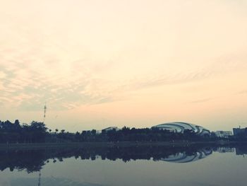 Scenic view of lake at sunset