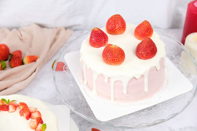 High angle view of strawberries in plate on table