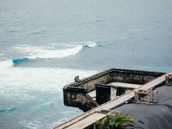 High angle view of swimming pool by sea