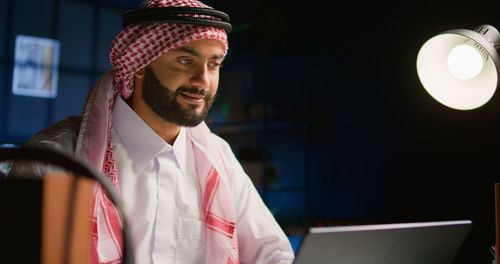 Portrait of young man using mobile phone