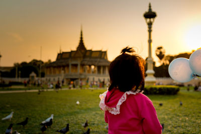 View of girl watching royal stupa