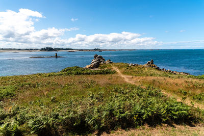 Scenic view of the island of batz a sunny day of summer