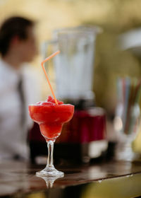 Close-up of red wine glass