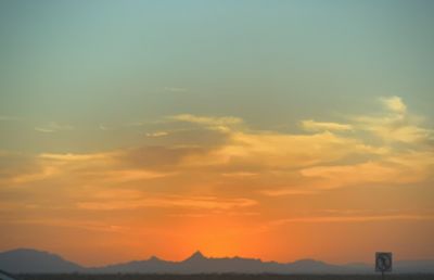 Scenic view of dramatic sky during sunset