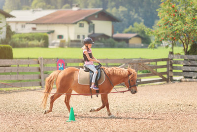 Man riding horse