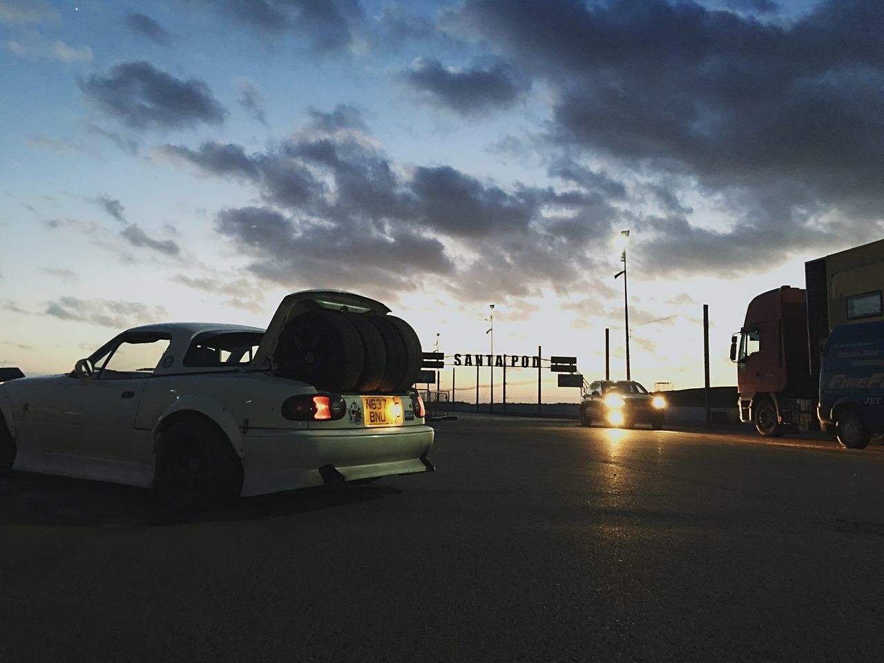 cloud - sky, sky, transportation, car, travel, mode of transport, no people, night, outdoors, city, illuminated