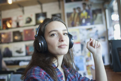 Young woman wearing headphones.