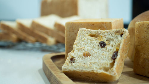 Close-up of bread on cutting board