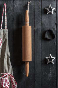 Directly above shot of rolling pin on table