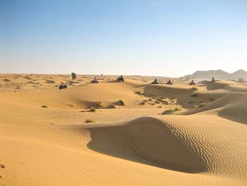 Scenic view of desert against clear sky