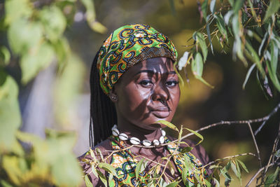 Portrait of young woman looking away