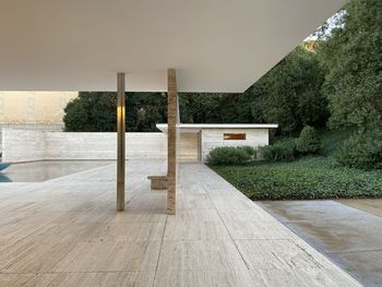 Walkway by building against sky