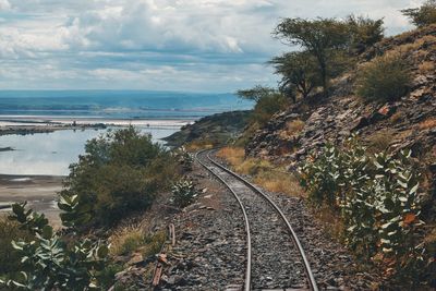 Railway tracks against a lake background, lake magadi, rift valley, kenya