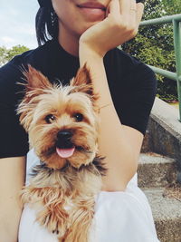 Portrait of woman with dog