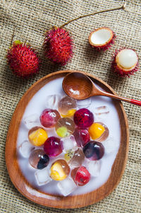 Directly above shot of fruit jelly dessert served in plate on table