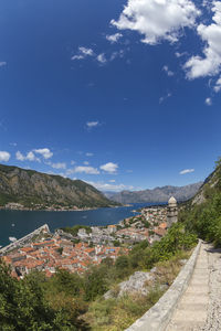 Scenic view of mountains against blue sky