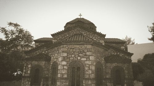 Low angle view of built structure against clear sky