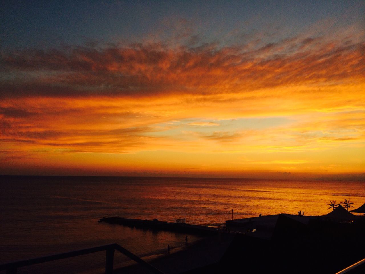 sunset, sea, horizon over water, orange color, water, sky, scenics, beauty in nature, tranquil scene, tranquility, cloud - sky, idyllic, nature, silhouette, cloud, beach, dramatic sky, outdoors, no people, built structure