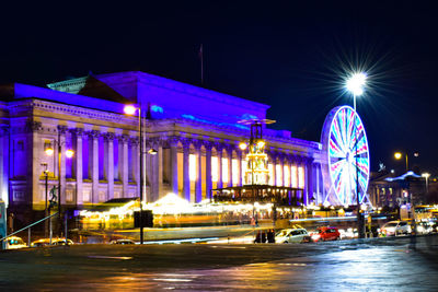 Illuminated building at night