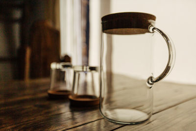 Close-up of glass jar on table