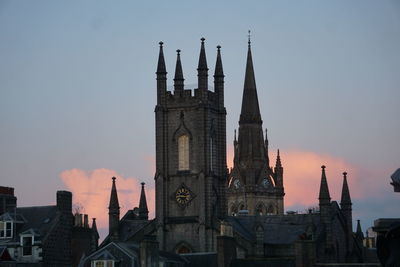 Low angle view of cathedral against sky during sunset