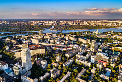 High angle view of city buildings against sky