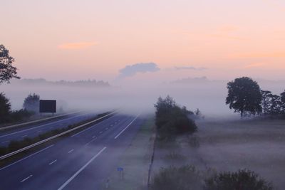 Road against sky during foggy weather