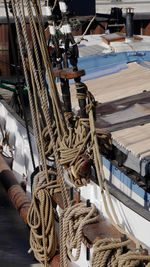 High angle view of sailboats moored at harbor