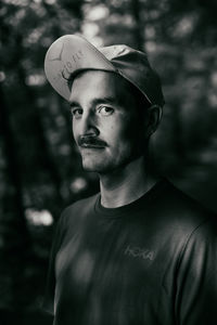 Portrait of young man standing outdoors