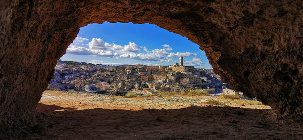 View of rock formations through cave