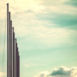 Low angle view of building against cloudy sky