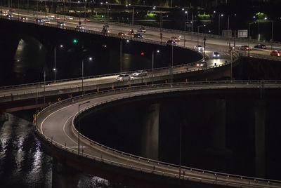 High angle view of light trails on elevated road at night