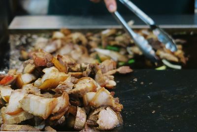 Close-up of roasted pork on table