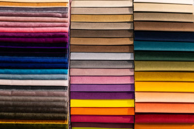 Catalog of multi-colored fabric samples. textile industry background. colored cotton fabric. palet