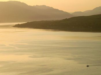 Scenic view of mountains at sunset