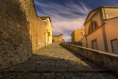 Narrow alley along buildings