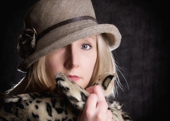 Portrait of woman wearing hat