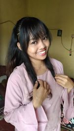 Portrait of a smiling young woman