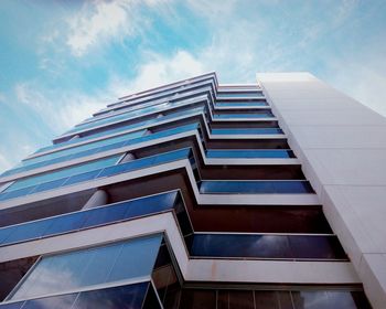 Low angle view of modern building against sky