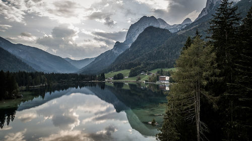 Scenic view of lake and mountains against sky