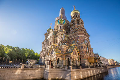 Low angle view of temple against building