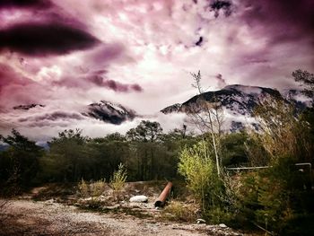 Scenic view of landscape against cloudy sky