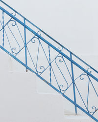 Low angle view of staircase against clear sky during sunny day