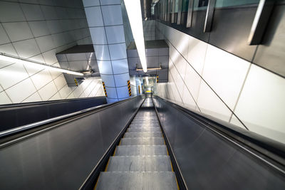 High angle view of elevator in illuminated subway station