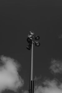 Low angle view of power line against sky