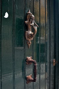 Close-up of closed door knocker