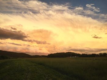 Scenic view of landscape against sky during sunset