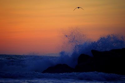 Scenic view of sea at sunset