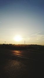 Road against sky during sunset